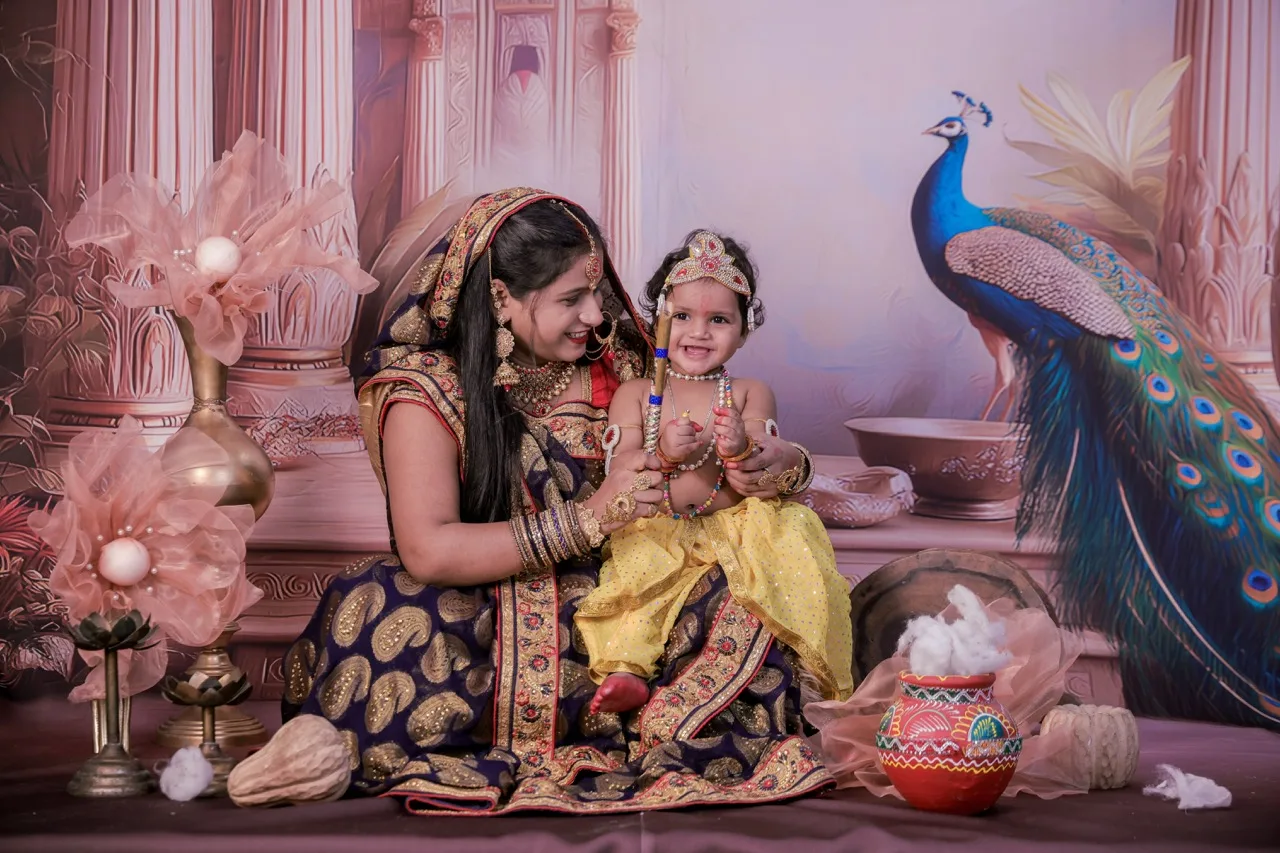 Yashoda ma looking lovingly at baby Krishna for a themed photoshoot, Janmashtami Krishna theme baby photoshoot in Delhi NCR.
