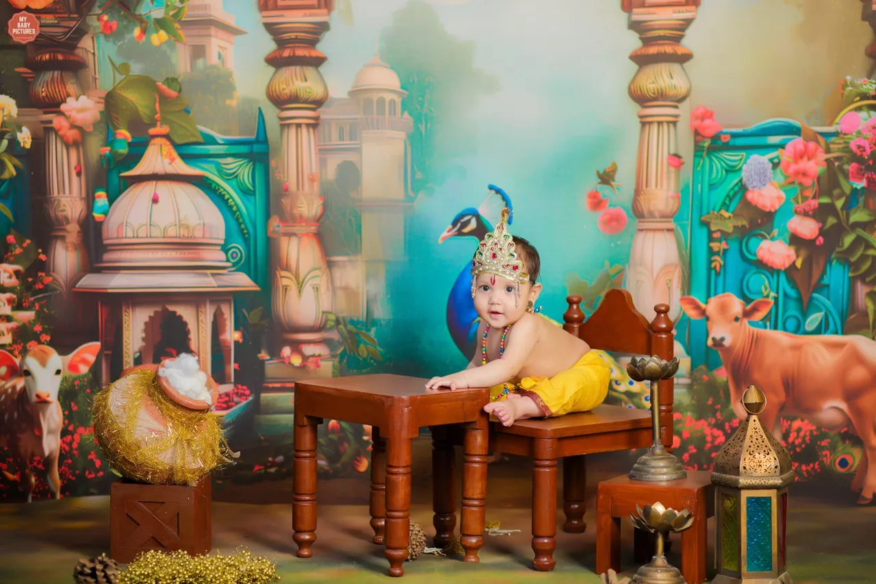 Baby boy in Krishna outfit for a professional studio photoshoot in Delhi, Janmashtami Krishna theme baby photoshoot in Delhi NCR.