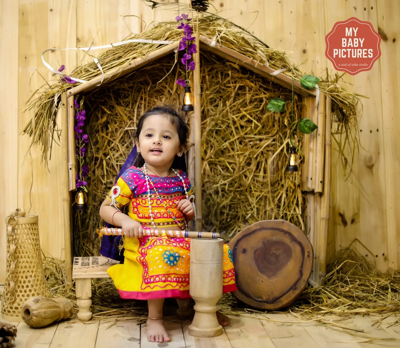 Little girl dressed as Radha for a Janmashtami photoshoot in a Kutiya theme, Janmashtami Krishna theme baby photoshoot in Delhi NCR.